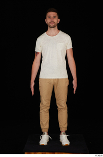  Trent brown trousers casual dressed standing white sneakers white t shirt whole body 0009.jpg